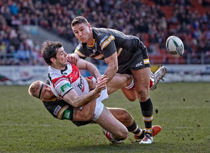 Trio in a Tackle by Austin Thomas Trio in a Tackle by Austin Thomas
