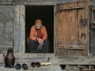 Lady Knitting in Doorway by Robert Millin Lady Knitting in Doorway by robert Millin - Photography Club